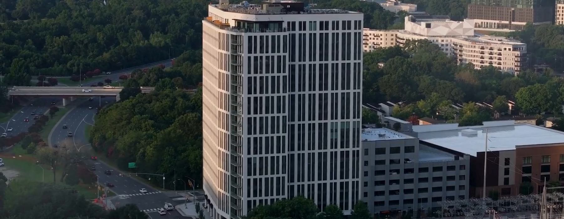 overhead shot of a tall building in a city