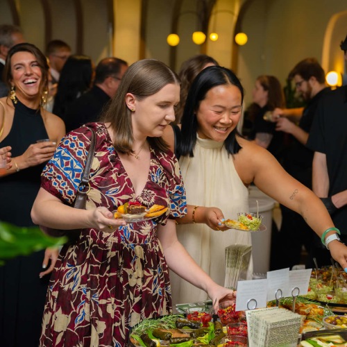 residents grabbing food at an event