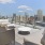 Rooftop lounge with city view and sofas