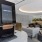 A large clubroom with ample seating and large windows
