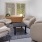 A room with lounge chairs 