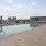 Resort-style swimming pool with lounge seating