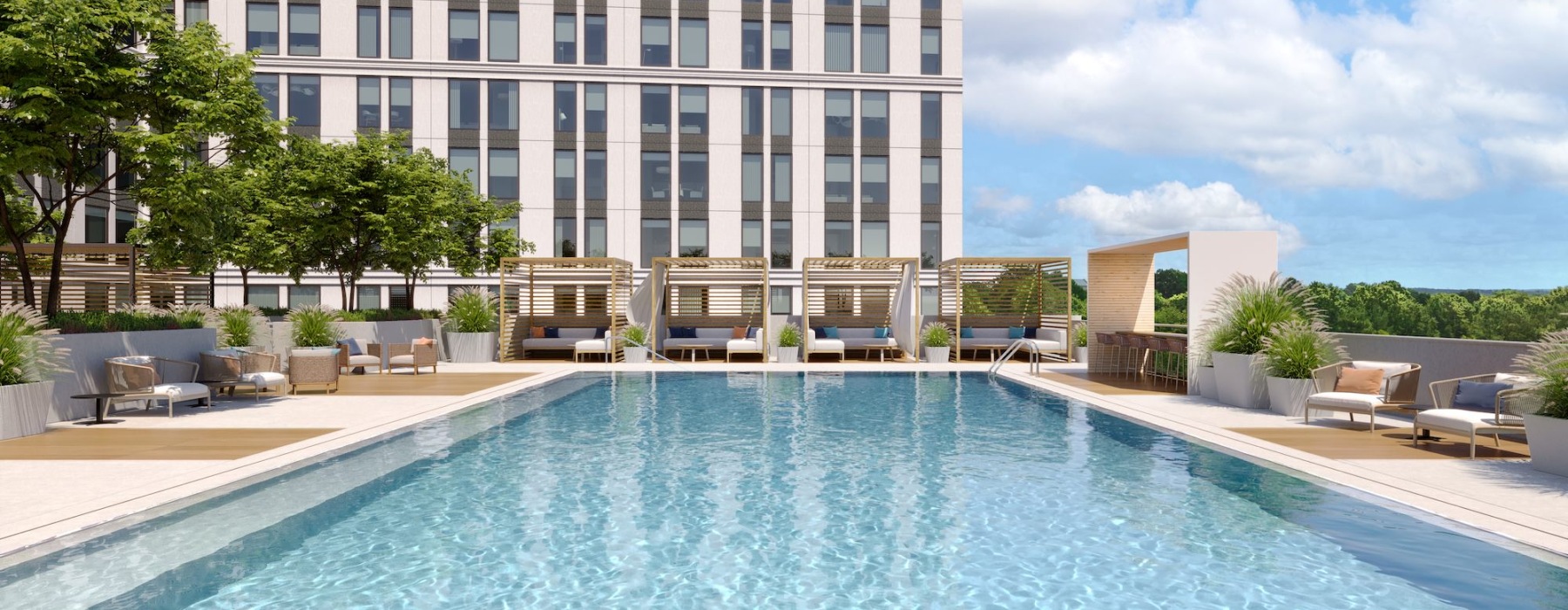 Resort-style swimming pool with lounge seating
